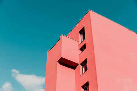 View from below on a pink modern house and sky  Vintage pastel colors  minimalist concept