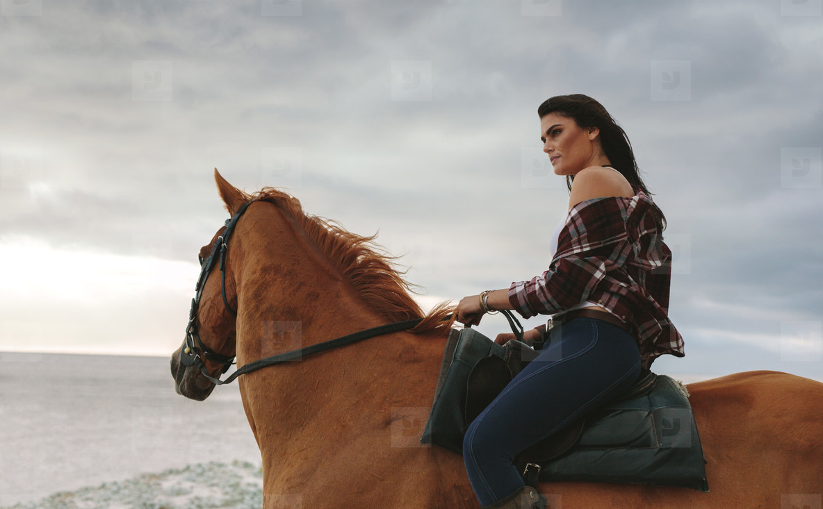 Woman riding man. Women's riding face. Cruise collection 2018 Mexican horsewoman. People Ride a Horse.