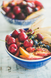 Healthy smoothie breakfast bowl with fruit and berries