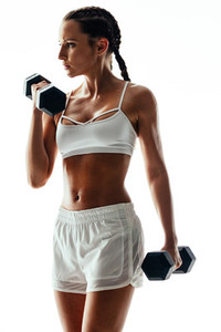 Fitness model doing bodybuilding workout