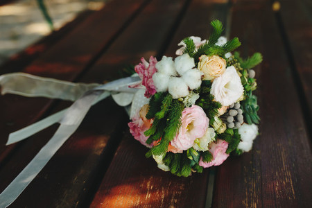Wedding bouquet on a bench