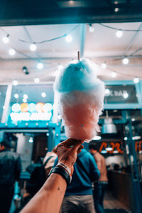 hand holding cotton candy