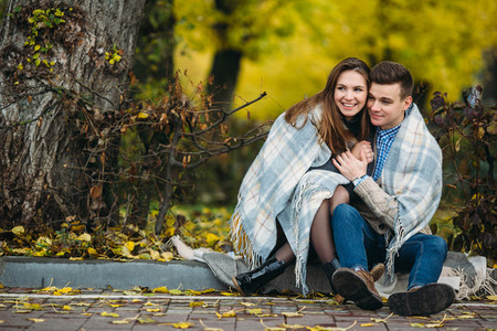 Young couple at the park in autumn season