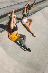 Friends in playful mood at skate park