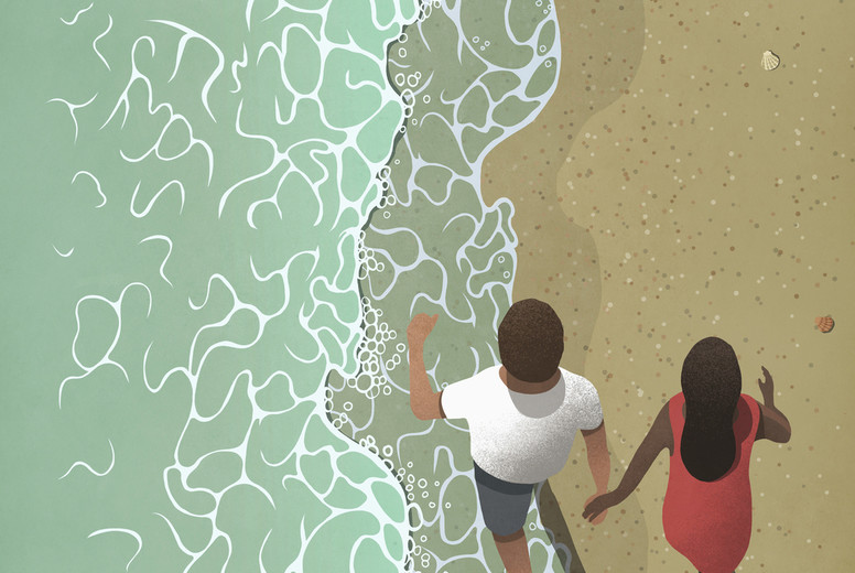 View from above couple holding hands walking on ocean beach #01