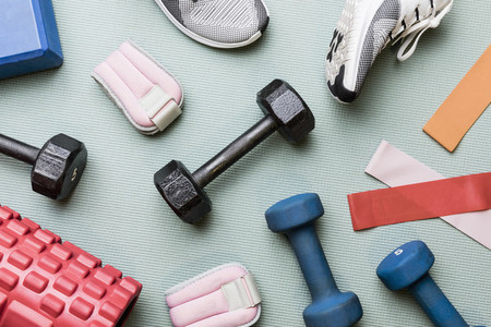 View from above dumbbells and exercise equipment   knolling 01
