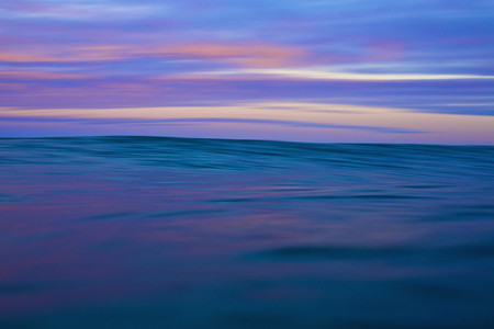 Tranquil blue and pink ocean and sky at sunrise 01