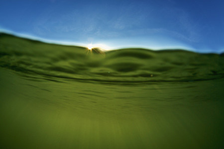 Sunlight streaming through ocean water 01
