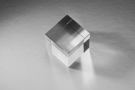 Clear   artificial resin cube reflecting light 01