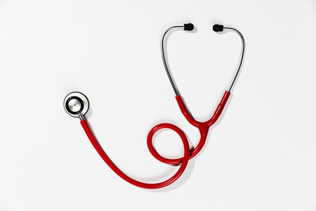 Red stethoscope on white background 01