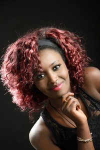 Beautiful black woman on black background  Studio shot