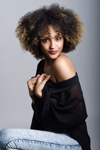 Young black woman with afro hairstyle