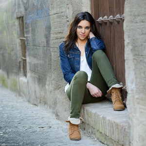 Young beautiful woman in a urban background