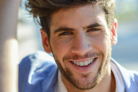 Young Man smiling outdoors