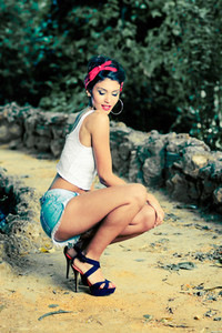 Pin up girl  American style  in a garden