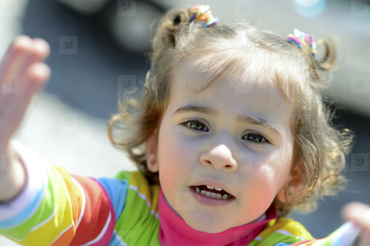 Adorable little girl combed with pigtails