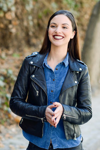 Young woman wearing casual clothes in urban background