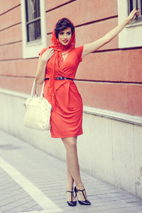 Beautiful woman in urban background Vintage style