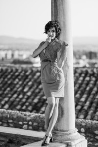Beautiful woman in urban background  Vintage style