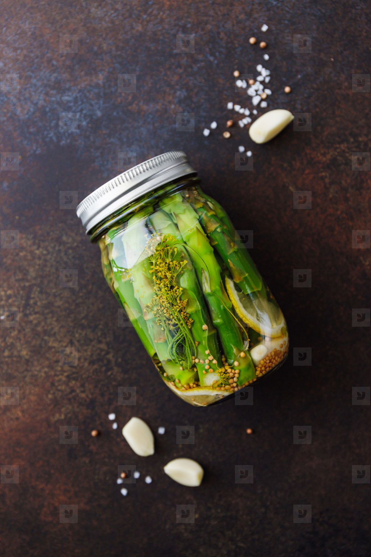 Top view of pickled asparagus in a jar  Seasonal canning vegetable recipe