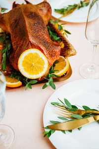 Roasted goose with oranges on a golden tray for celebrate event  Thanksgiving or Christmas family dinner