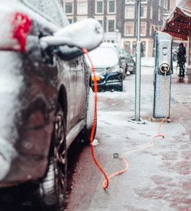 Electric car plug charging in the winter