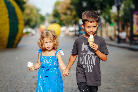 little boy and little girl with ice cream