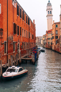 The street with a boat in Venice  Italy