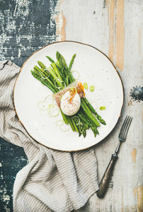 Healthy breakfast with green asparagus soft boiled egg  bacon