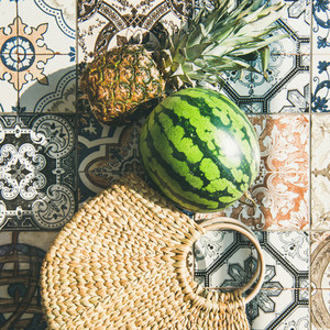 Summer lifestyle background with fruits and straw bag  square crop