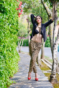 Beautiful woman  model of fashion  wearing leopard pants