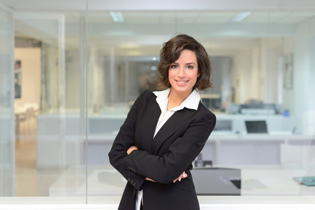 Business woman in a office  Crossed arms