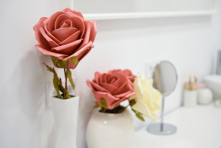 Decoration details in modern wellness center with flower vase an