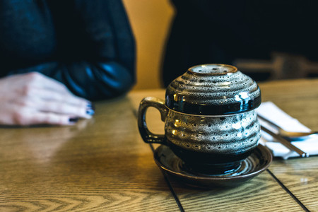 Korean tea pot on a wooden table
