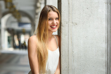 Beautiful blonde girl in urban background