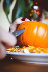 Carving halloween pumpkin