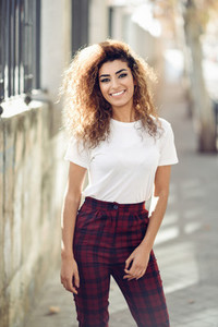 Arab girl in casual clothes in the street
