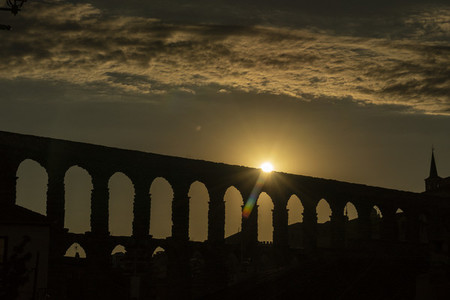 View of the famous Aqueduct of Segovia at Sunset