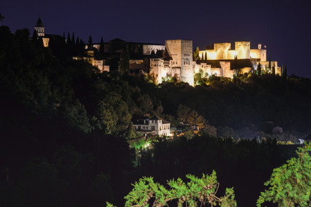Night view of the famous Alhambra palace in Granada from Sacromo