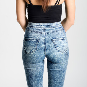 Back side of woman wearing high waisted jeans