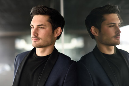 Handsome man  model of fashion  wearing modern suit