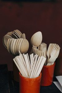Bamboo fork  spoon and chopstick utensils in crocks