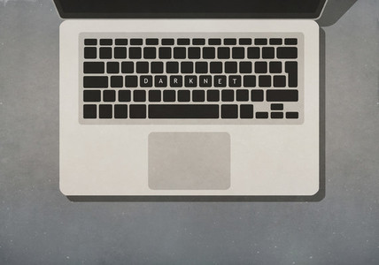 Darknet text on laptop keyboard