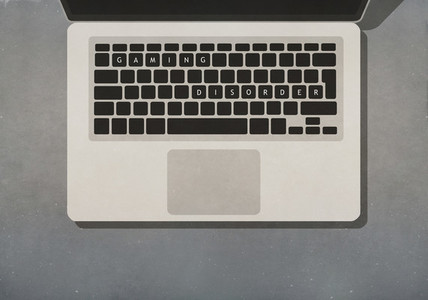 Gaming Disorder text on laptop keyboard