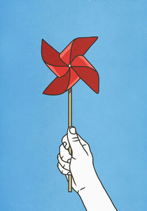 Hand holding red pinwheel