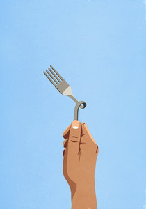 Hand holding twisted fork