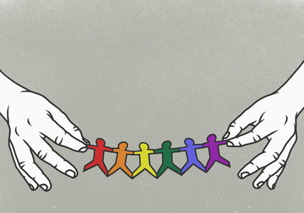 Hands holding LGBTQI rainbow paper chain