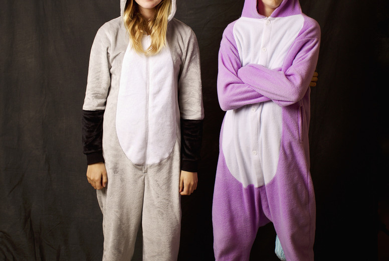 Portrait confident girls in animal costume pajamas