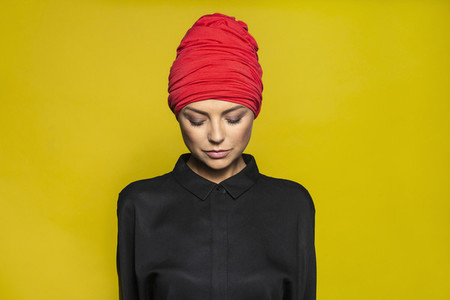 Portrait serene woman wearing headscarf