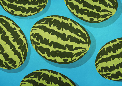 Whole watermelons on blue background